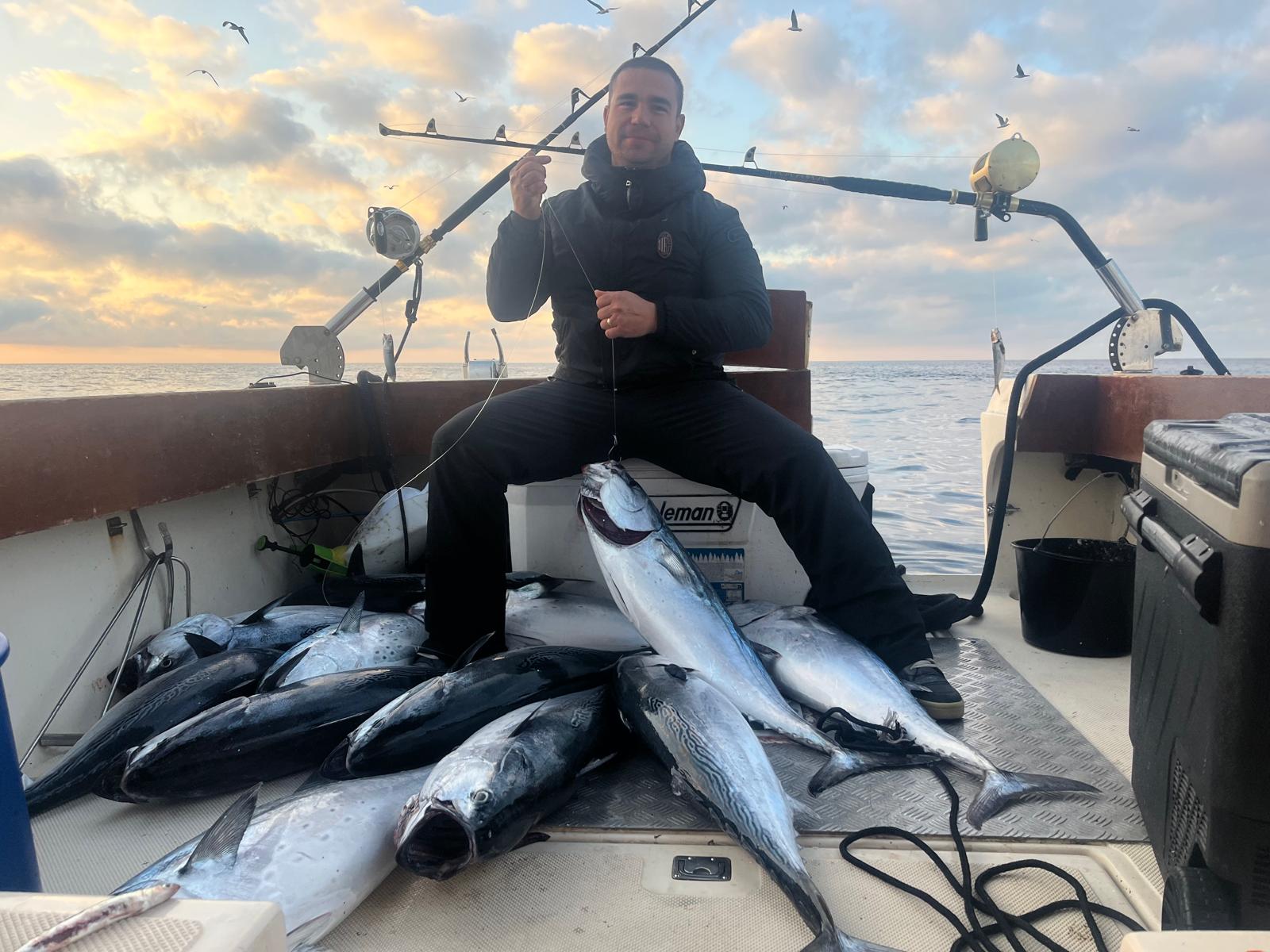 Capt. Ivan with a deck of bluefin and bonito at sunrise aboard Stari Ribar